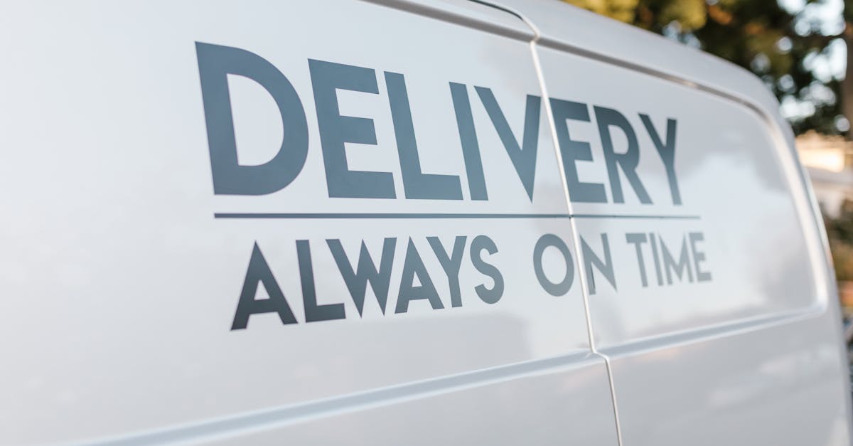 Close-up of delivery van with slogan 'Always On Time' emphasizing timely service.